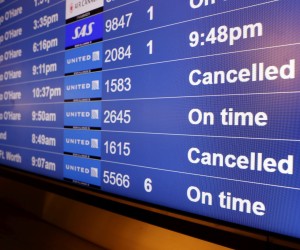 epaselect epa09656220 Cancelled United Airlines flights to Chicago O'Hare and Cleveland on the flight information display system at the San Francisco International Airport on Christmas Eve in San Francisco, California, USA, 24 December 2021. Thousand of flights were cancelled globally and United and and Delta Airlines cancelled over 200 flights domestically on Friday, 24 December, alone citing the personnel shortages due to the surge of Omicron variant of COVID-19 infections.  EPA/JOHN G. MABANGLO