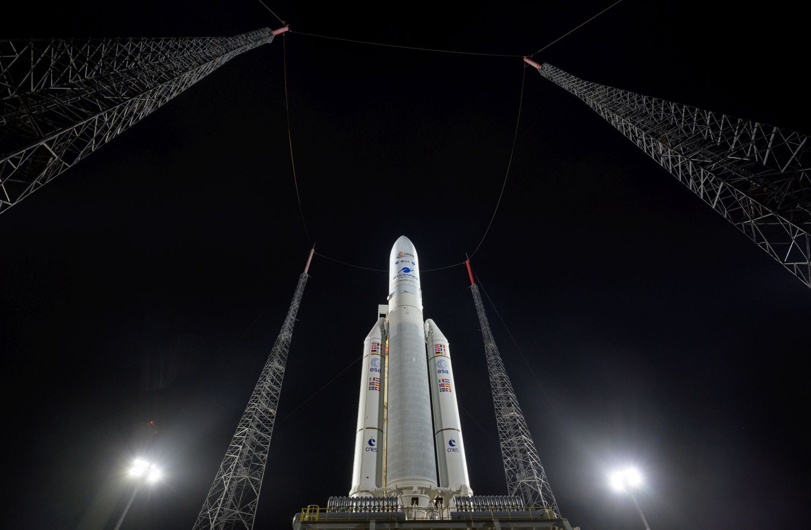 epa09656352 A handout photo made available by the NASA shows Arianespace's Ariane 5 rocket with NASA’s James Webb Space Telescope onboard, at the launch pad at Europe’s Spaceport, the Guiana Space Center in Kourou, French Guiana, 23 December 2021 (issued 25 December 2021). The James Webb Space Telescope (sometimes called JWST or Webb) is a large infrared telescope with a 21.3 foot (6.5 meter) primary mirror. The observatory will study every phase of cosmic history from within our solar system to the most distant observable galaxies in the early universe.  EPA/NASA/Bill Ingalls HANDOUT MANDATORY CREDIT: (NASA/Bill Ingalls) HANDOUT EDITORIAL USE ONLY/NO SALES