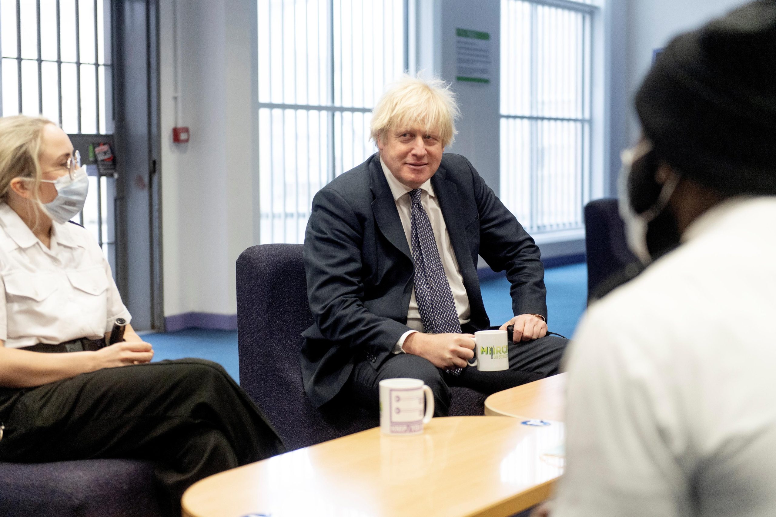 Britain's Prime Minister Boris Johnson, and Deputy PM Dominic Raab (not pictured) visit HMP Isis, Greenwich, ahead of the publication of the Prisons White Paper in London, Britain December 7, 2021. Geoff Pugh/Pool via REUTERS