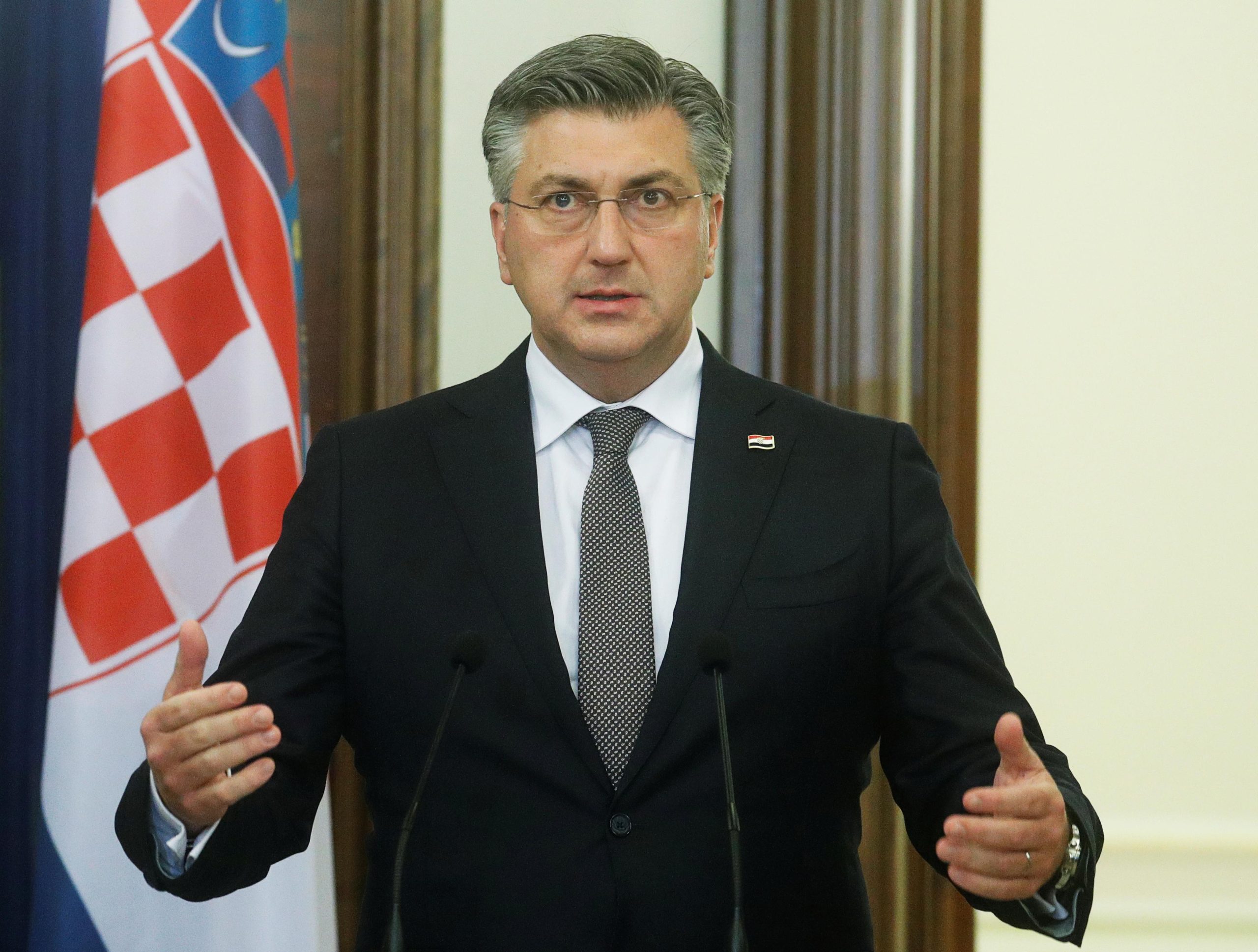 Croatian Prime Minister Andrej Plenkovic speaks during a joint statement with Ukrainian President Volodymyr Zelenskiy (not seen) in Kyiv, Ukraine December 8, 2021. REUTERS/Valentyn Ogirenko/Pool