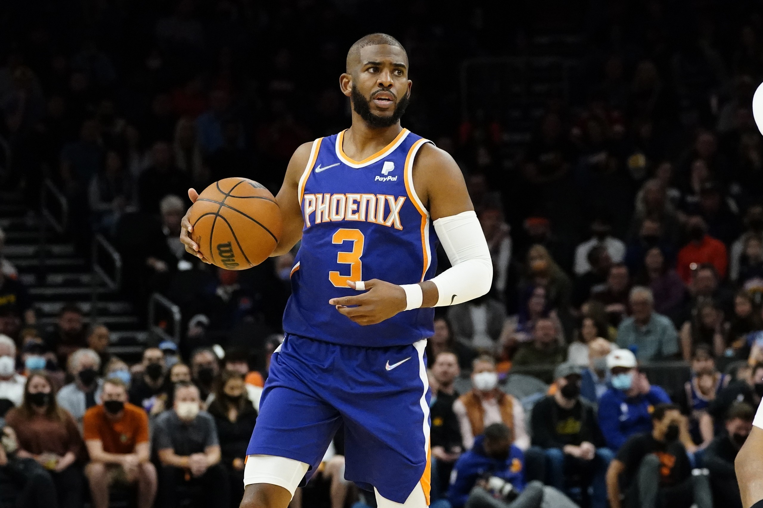 Phoenix Suns guard Chris Paul (3) looks to pass against the Utah Jazz during the first half of an NBA basketball game, Monday, Jan. 24, 2022, in Phoenix. (AP Photo/Matt York)