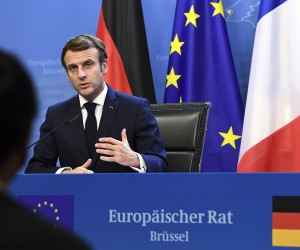 epa09645879 France's President Emmanuel Macron speaks during a joint press conference with Germany's Chancellor Olaf Scholz (out of frame) during an European Union (EU) summit at the European Council Building at the EU headquarters in Brussels, Belgium, 17 December 2021.  EPA/JOHN THYS / POOL