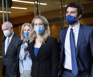 epa09645883 Elizabeth Holmes (2-R), founder of Theranos, her partner, Billy Evans (R), and her mother Noel (2-L), depart the Robert F. Peckham Federal Building and US Courthouse in San Jose, California, USA, 16 December 2021. Closing arguments began for the former CEO Elizabeth Holmes, and Theranos, her failed blood-testing technology start-up company.  EPA/JOHN G. MABANGLO