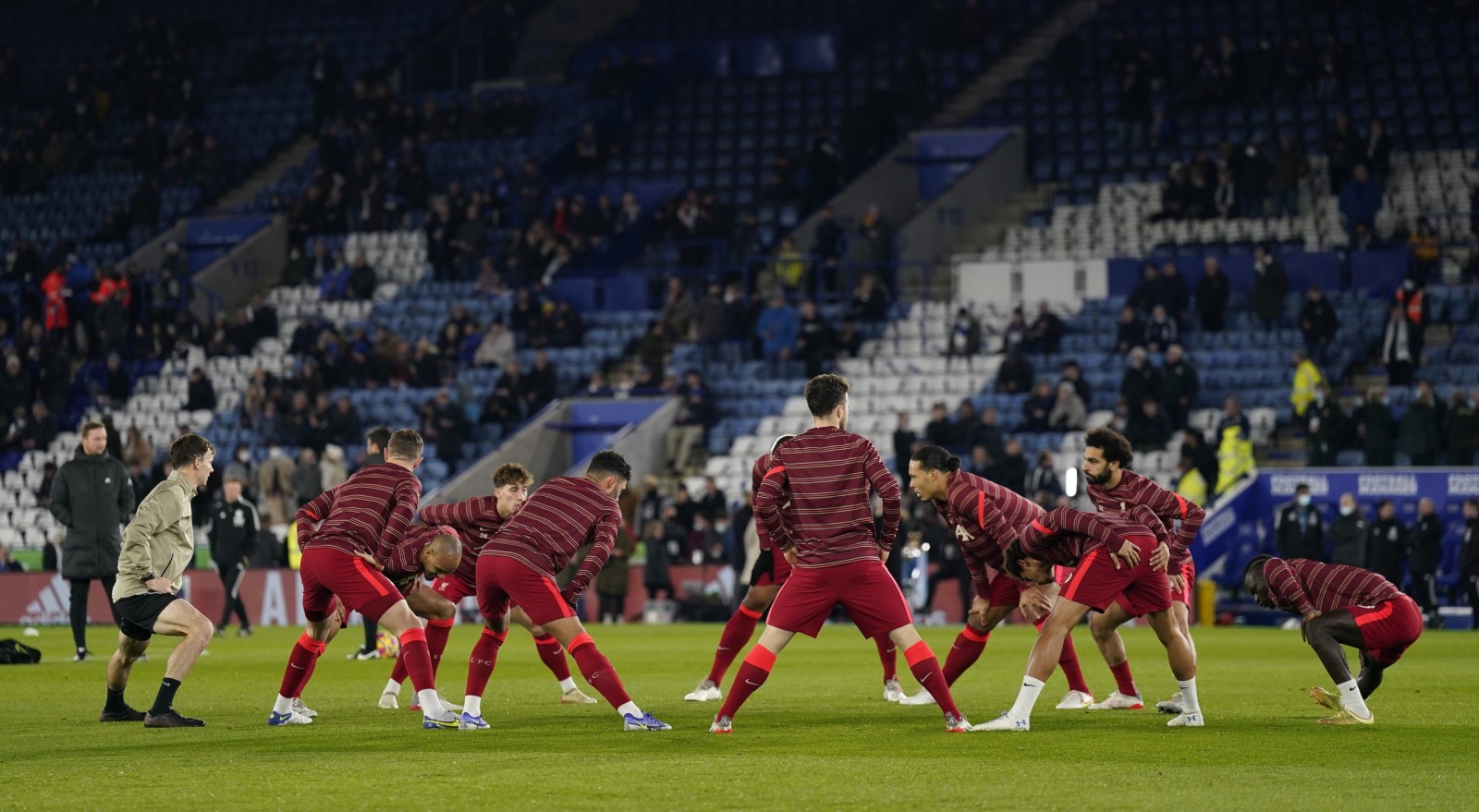 epa09659099 Liverpool players warm-up for the English Premier League match between Leicester City and Liverpool FC in Leicester, Britain, 28 December 2021.  EPA/TIM KEETON EDITORIAL USE ONLY. No use with unauthorized audio, video, data, fixture lists, club/league logos or 'live' services. Online in-match use limited to 120 images, no video emulation. No use in betting, games or single club/league/player publications