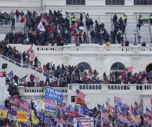 epa09664290 (19/24) (FILE) - Pro-Trump protesters occupy the grounds of the West Front of the US Capitol, including the inaugural stage and viewing stands, in Washington, DC, USA, 06 January 2021 (reissued 03 January 2021). Following the November 2020 US presidential election, a tone set by supporters of defeated US President Donald Trump escalated further. Trump, who was refusing to concede the victory of Joe Biden, claiming voter fraud and rigged elections, told supporters and white nationalist extreme-right group Proud Boys to respectively 'Stop the Steal' and to 'stand back and stand by'. His social media accounts were suspended and the alt-right platform Parler gained in user numbers. 
 
On 06 January 2021, incumbent US vice president Pence was due to certify the Electoral College votes before Congress, the last step in the process before President-elect Biden was to be sworn in. In the morning, pro-Trump protesters had gathered for the so-called Save America March. Soon after Trump finished his speech at the Ellipse, the crowd marched to the Capitol. The attack had begun. 
 
Rioters broke into the Capitol building where the joint Congress session was being held. Lawmakers barricaded themselves inside the chambers and donned tear gas masks while rioters vandalized the building, some even occupying offices such as House Speaker Pelosi's. Eventually in the evening the building was cleared from insurrectionists, and the Congress chambers reconvened their session, confirming Joe Biden as the winner of the 2020 US presidential election. 

In the aftermath, more than 600 people were charged with federal crimes in connection to the insurgency, and close Trump aides such as Steve Bannon, Mark Meadows and Roger Stone were subpoenaed by the House select committee investigating the attack. Trump himself was acquitted by the Senate in his second impeachment trial, this time for "inciting an insurrection".  EPA/MICHAEL REYNOLDS  ATTENTION: This Image is part of a PHOTO