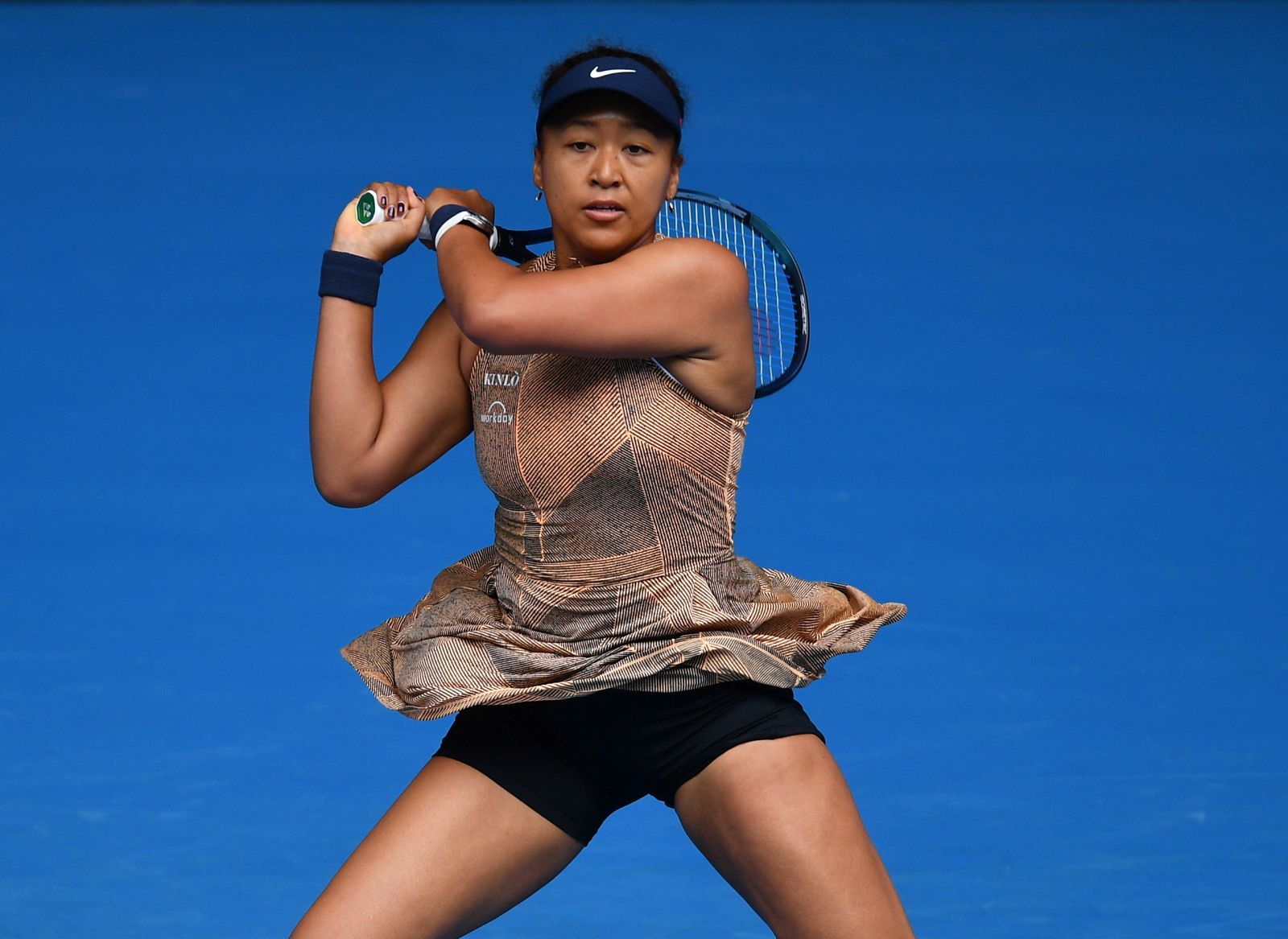 epa09665401 Naomi Osaka of Japan in action during her match against Alize Cornet of France on day two of the Melbourne Summer Set tennis tournament at Melbourne Park in Melbourne, Australia, 04 January 2022.  EPA/JAMES ROSS  AUSTRALIA AND NEW ZEALAND OUT