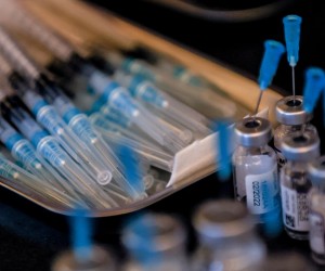 epa09666199 Syringes with Moderna vaccine against COVID-19 shots Sage are on display during a vacination campaign in a Beach Bar and Restaurant in Berlin, Germany, 04 January 2021.. In a measure to reach more people, restaurants and clubs in Berlin start a Covid-19 vaccination campaign, where citizens get their vacine shots at the clubs & restaurants in the German capital.  EPA/FILIP SINGER