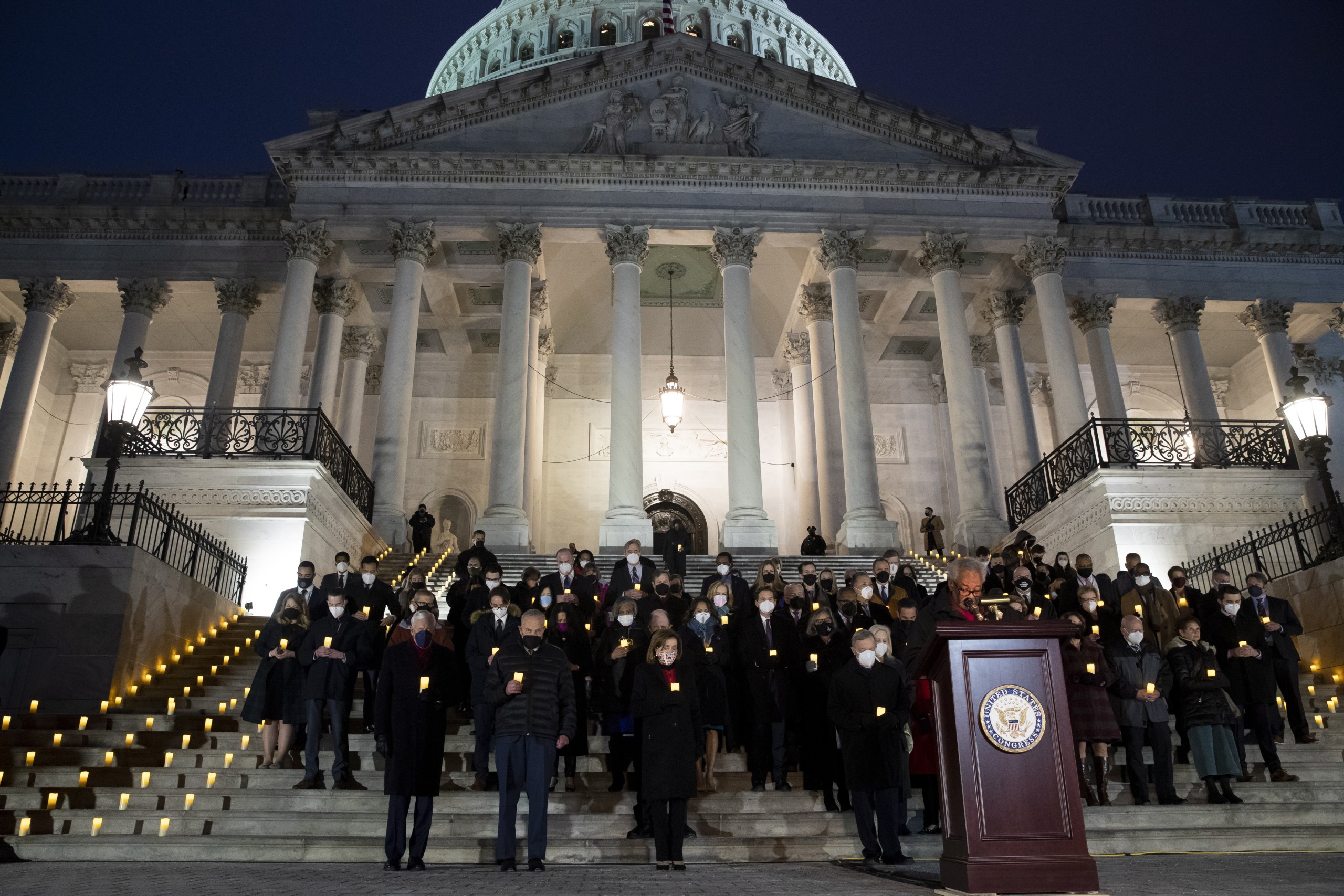 epa09670917 US Speaker of the House Nancy Pelosi (Front 3-L), Senate Majority Leader Chuck Schumer (Front 2-L), House Majority Leader Steny Hoyer (Front L), along with  members of Congress and staff; attend a prayer vigil to mark the one-year anniversary of the January 6th attack on the Capitol, in Washington, DC, USA, 06 January 2022. US Speaker of the House Nancy Pelosi and Senate Majority Leader Chuck Schumer held a prayer vigil with other members of Congress and staff to commemorate the anniversary of the US Capitol riot when Trump supporters stormed the building as the 2020 presidential election results were being formally certified.  EPA/MICHAEL REYNOLDS