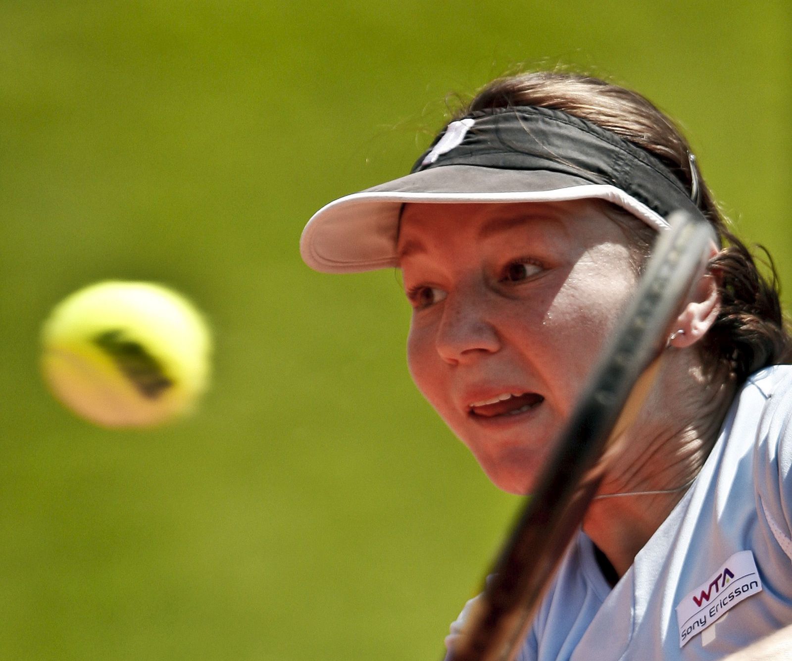 epa09671962 (FILE) - Czech Republic tennis player Renata Voracova in action during her match against Jarmila Gajdosova of Australia, at the Tennis Estoril Open, in Oeiras, Portugal, 26 April 2011 (reissued 07 January 2021). Australian authorities revoked the visa of Czech tennis player Renata Voracova and put her under 'medical detention', Australian media are cited on 07 January 2021. Veracova was scheduled to compete in the 2022 Australian Open starting 17 January.  EPA/MARIO CRUZ *** Local Caption *** 02703548