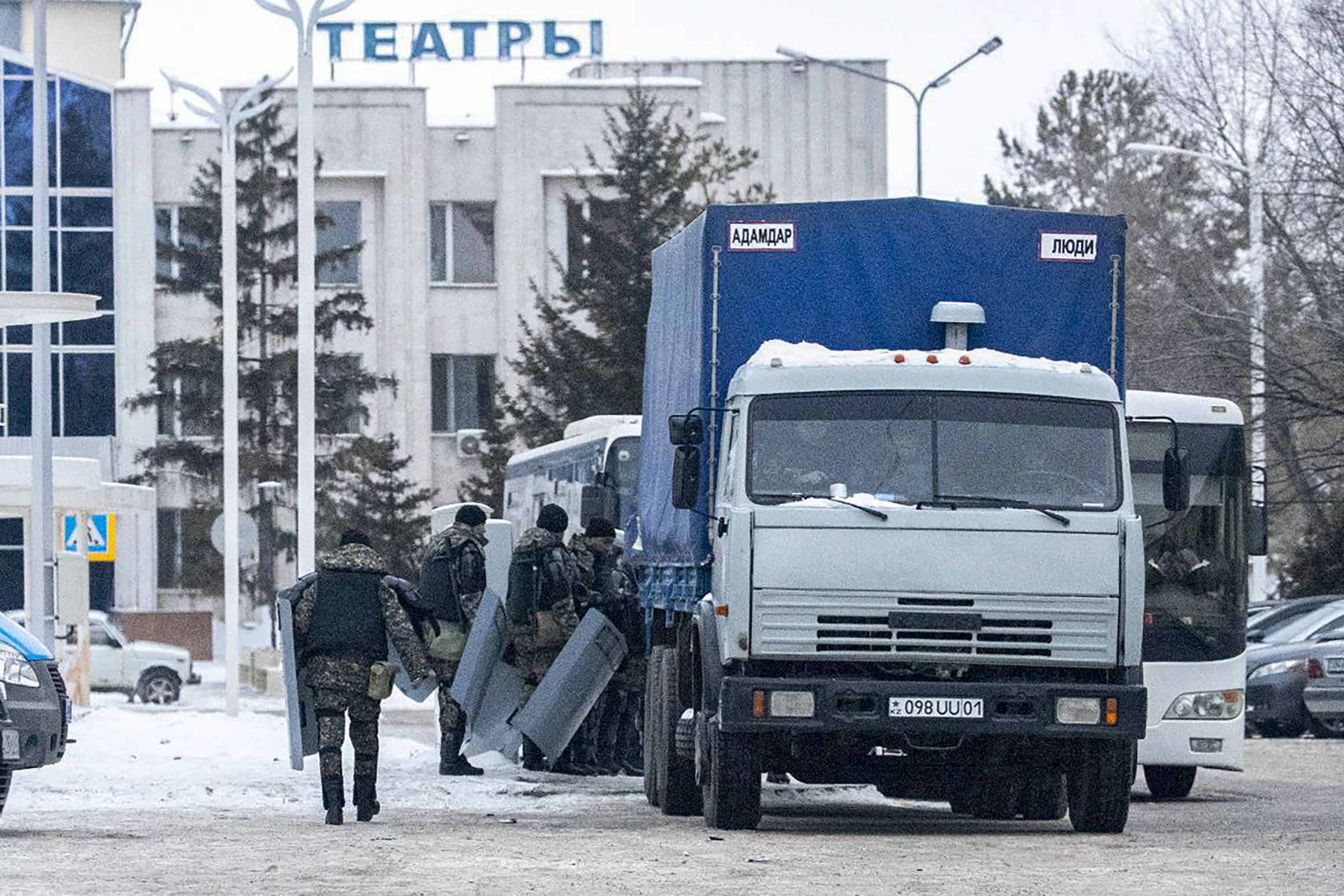 epa09672801 Kazakh servicemen guard an area in downtown Nur-Sultan, the capital city of Kazakhstan, 08 January 2022. Mass protests erupted in the Central Asian country in the first days of 2022, amid the discontent of the residents of the cities of Zhanaozen and Aktau in the west of the country after the rise in prices of liquefied petroleum gas (LPG), which is widely used to refuel cars. Subsequently, protesters took to the streets in other cities, where several clashes with security forces made victims from all sides. Kazakh President Tokayev dismissed the government and ordered the introduction of regulation of selling prices for fuel, but the unrest continued. He also headed a Security Council, at the first meeting of which he called the situation in Kazakhstan 'undermining the integrity of the state' and said that he had turned to the Collective Security Treaty Organization (CSTO) for help. During the riots, members of the CSTO organization sent collective peacekeeping forces to the country at the request of the Kazakh president.  EPA/RADMIR FAHRUTDINOV