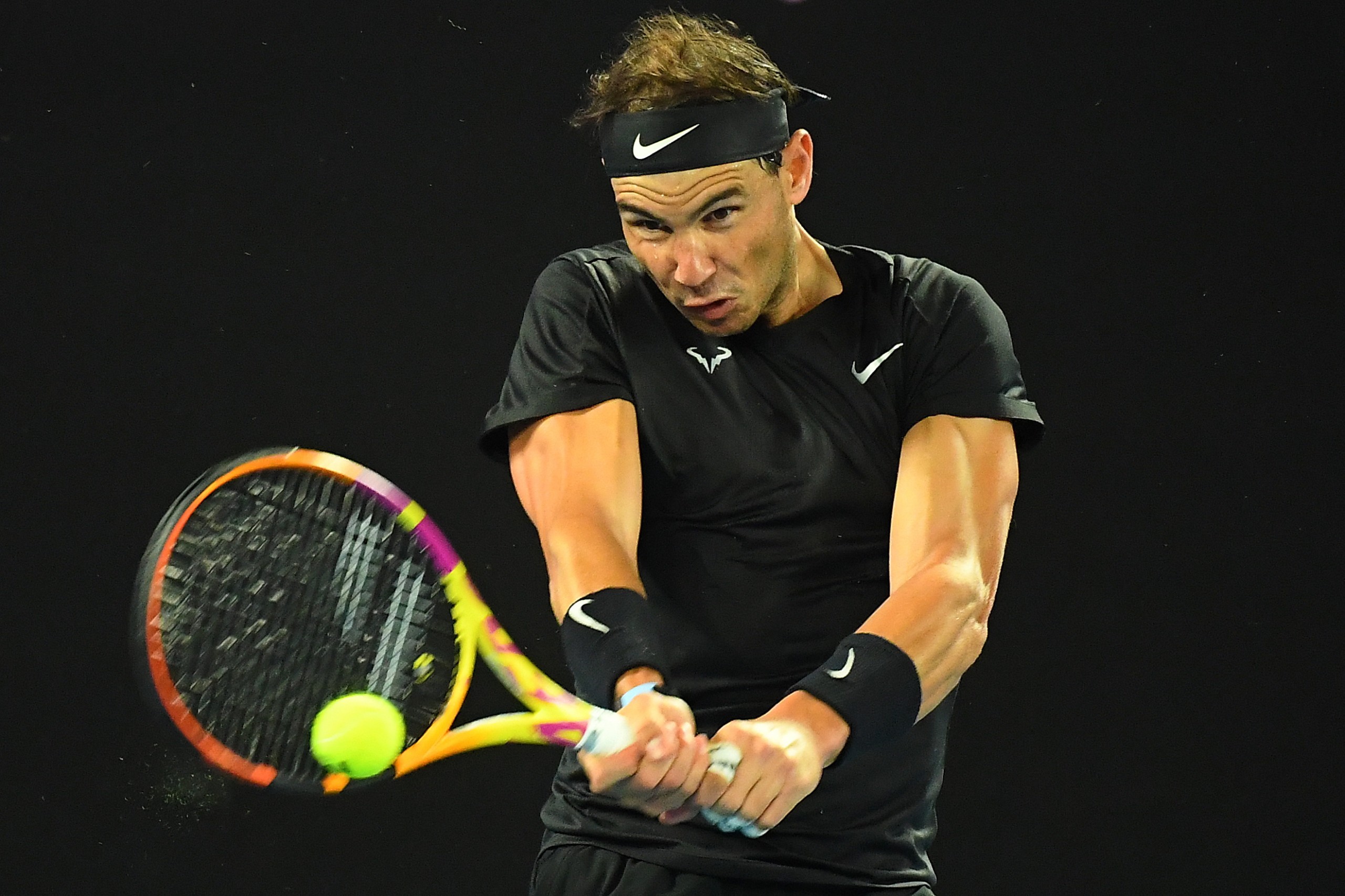epa09673275 Rafael Nadal of Spain in action during his match against Emil-Ruusuvuor of Finland on Day 6 of the Melbourne Summer Set tennis tournament at Melbourne Park in Melbourne, Australia, 08 January 2022.  EPA/JAMES ROSS NO ARCHIVING AUSTRALIA AND NEW ZEALAND OUT