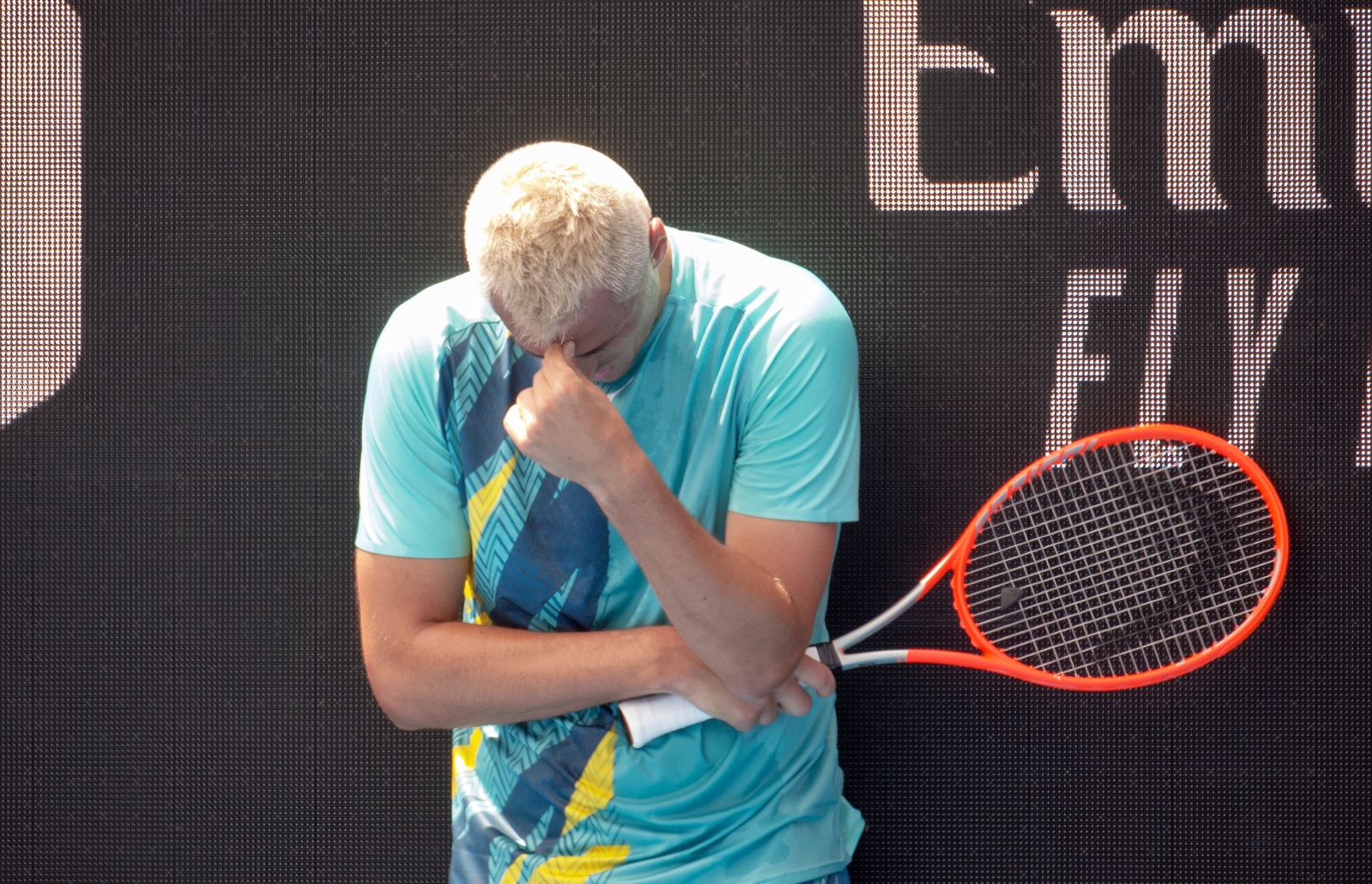 epa09678109 Australia’s Bernard Tomic is seen in action during his match against Russia’s Roman Safiullin during their Australian Open Qualifying match at Kia Arena in Melbourne Park, Melbourne, Australia, 11 January 2022.  EPA/LUIS ASCUI AUSTRALIA AND NEW ZEALAND OUT
