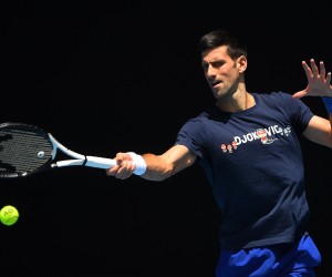 epa09679676 Novak Djokovic of Serbia is seen in action  during a training session at Melbourne Park in Melbourne, Australia, 12 January 2022.  EPA/JAMES ROSS  AUSTRALIA AND NEW ZEALAND OUT