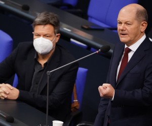 epa09680282 German Chancellor Olaf Scholz (R) answers questions next to German Minister for Economy and Climate Robert Habeck during a government consultation at the German parliament Bundestag in Berlin, Germany, 12 January 2022. On a regular basis, the German Chancellor is giving answers to questions of Members of Parliament at the German Bundestag. This time it is Olaf Scholz's first scheduled government consultation.  EPA/CLEMENS BILAN