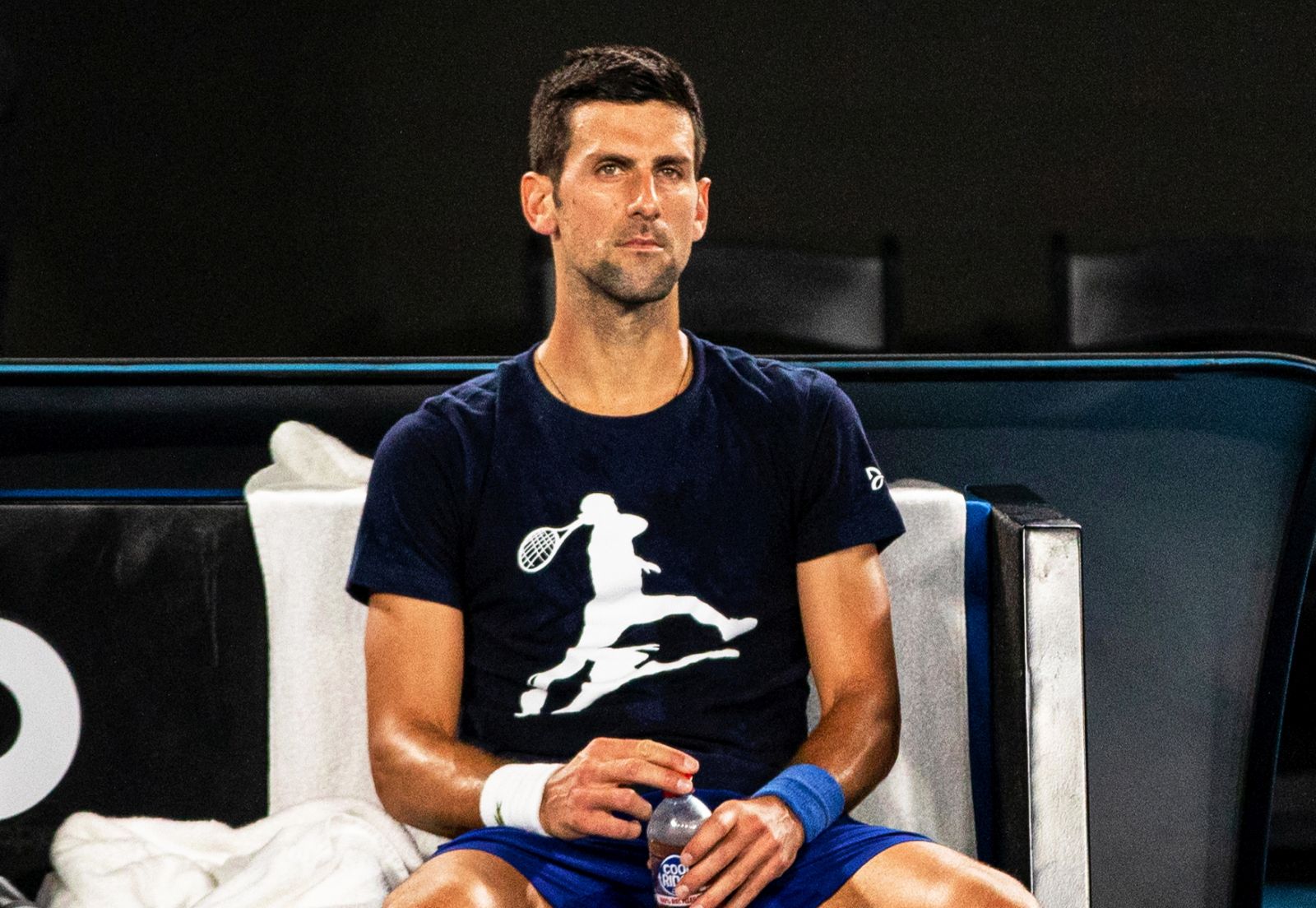 epa09688747 (FILE) - Novak Djokovic of Serbia rests during a practice session ahead of the Australian Open Grand Slam tennis tournament at Melbourne Park in Melbourne, Australia, 14 January 2022 (reissued 16 January 2022). Djokovic lost appeal against deportation from Australia and will not be able to defend his Australian Open title in Melbourne.  EPA/DIEGO FEDELE  AUSTRALIA AND NEW ZEALAND OUT