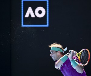 epa09690456 Rafael Nadal of Spain returns to Marcos Giron of the United States in their first round match on Day 1 of the Australian Open tennis tournament, at Melbourne Park, in Melbourne, Australia, 17 January 2022.  EPA/DAVE HUNT AUSTRALIA AND NEW ZEALAND OUT