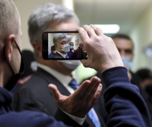 epa09690990 Former Ukrainian President Petro Poroshenko speaks before a court hearing in the Pechersky district court, where will choose a preventive measure on suspicion of treason and financing of terrorism, in Kiev, Ukraine, 17 January 2022. Ukrainian Prosecutor-General signed documents that obligate border guard personnel to arrest Petro Poroshenko immediately as he crossed the Ukrainian border. Poroshenko was summoned on 17 January 2022 to the Pechersky District Court for choosing of restraint with incrimination him the high treason and attempted looting of national values.  EPA/OLEG PETRASYUK