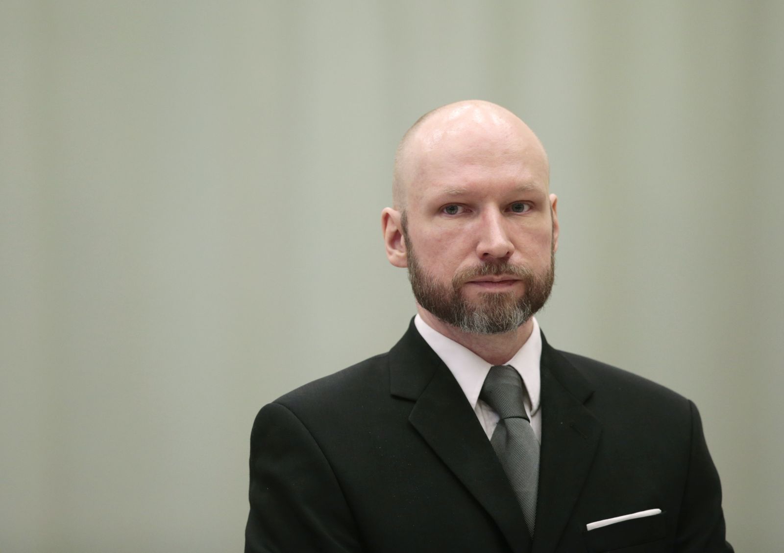 epa09691484 (FILE) - Anders Behring Breivik attends the last day of the appeal case in the Borgarting Court of Appeal at the Telemark prison gym, in Skien, Norway, 18 January 2017 (reissued 17 January 2022). Breivik, who changed his name to Fjotolf Hansen in 2017, is to appear before court for his parole hearing in Oslo on 18 January 2022. Mass murderer Anders Behring Breivik was sentenced to a maximum term of 21 years for killing 77 people in bomb and shooting attacks on 22 July 2011, and is entitled under Norwegian law to have his sentenced reviewed after ten years served.  EPA/LISE AASERUD NORWAY OUT *** Local Caption *** 53252761