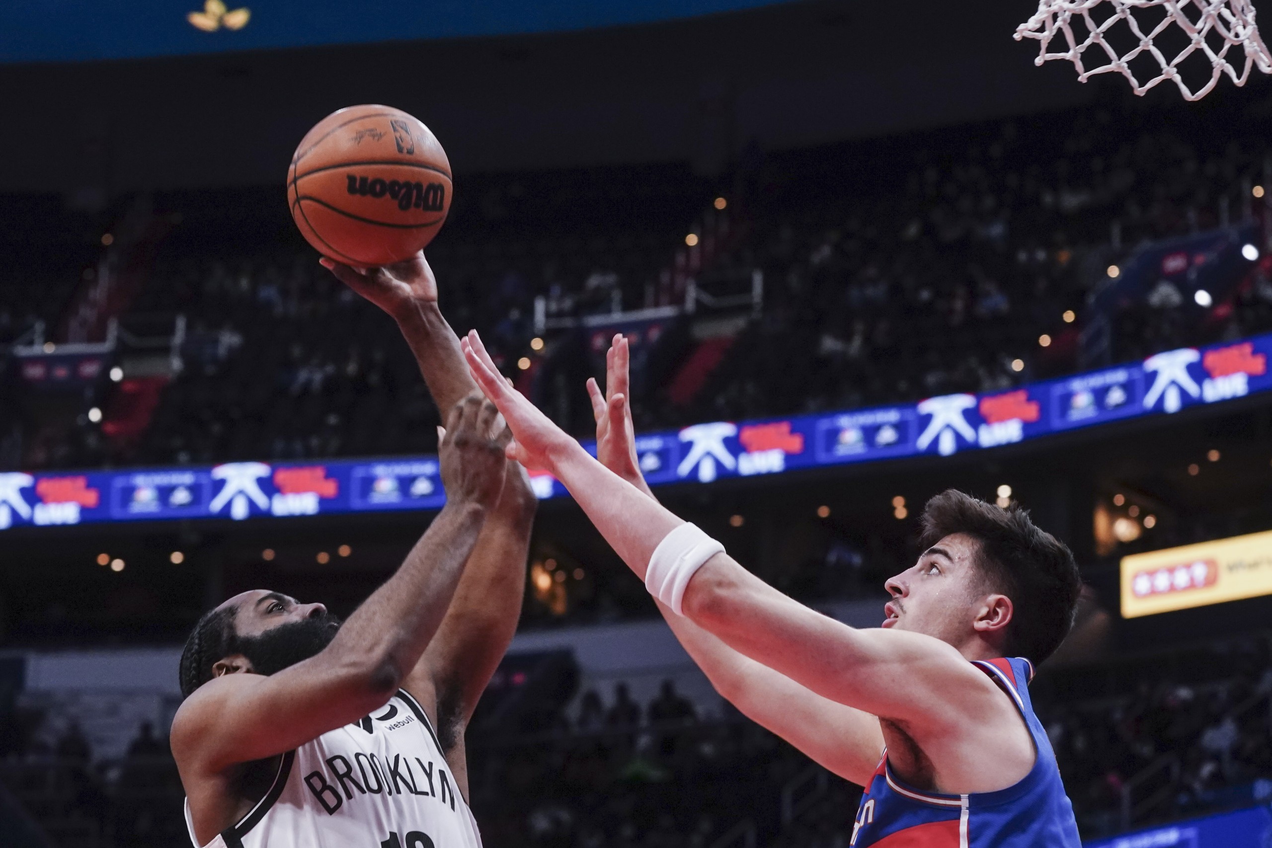 epa09696072 Brooklyn Nets guard James Harden (L) in action against Washington Wizards forward Deni Avdija (R) during the NBA basketball game between the Brooklyn Nets and the Washington Wizards at Capital One Arena in Washington, DC, USA, 19 January 2022.  EPA/SHAWN THEW  SHUTTERSTOCK OUT