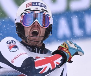 epa09702092 Winner Dave Ryding of Britain celebrates after the men's Slalom race of the FIS Alpine Skiing World Cup event in Kitzbuehel, Austria, 22 January 2022.  EPA/CHRISTIAN BRUNA