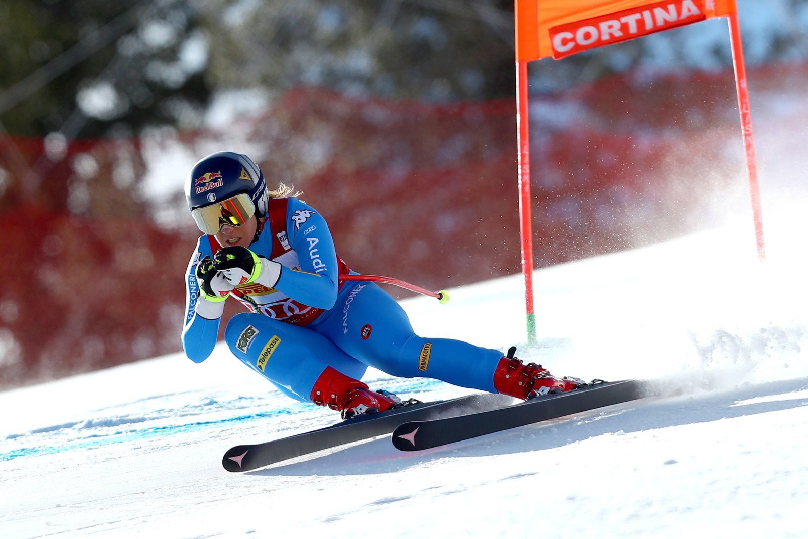 epa09702033 Sofia Goggia of Italy speeds down the slope during the Women's Downhill race at the FIS Alpine Skiing World Cup in Cortina d'Ampezzo, Italy, 22 January 2022.  EPA/ANDREA SOLERO