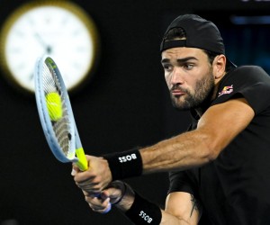 epa09703905 Matteo Berrettini of Italy in action against Pablo Carreno Busta of Spain during their 4th round match on Day 7 of the Australian Open at Melbourne Park in Melbourne, Australia, 23 January 2022.  EPA/DEAN LEWINS AUSTRALIA AND NEW ZEALAND OUT