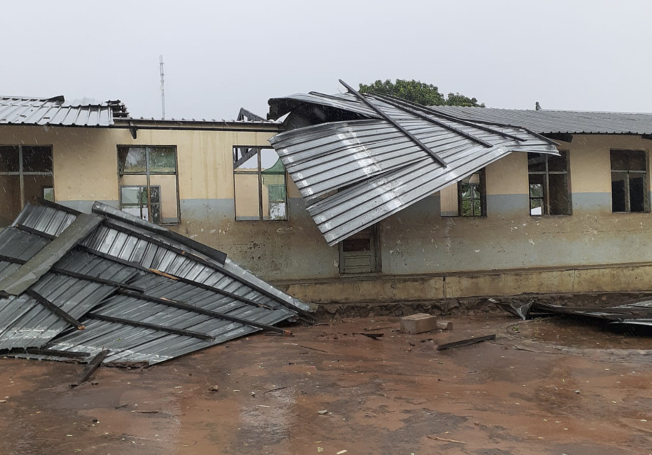 epa09706731 A handout photo made available by the International Federation of Red Cross and Red Crescent Societies (IFRC) shows a roof blown off a school building in Angoche, Mozambique 24 January 2022. Heavy rains and wind from a tropical weather system crossed the Mozambique chanel after striking Madagascar and has caused extensive damage due to the high winds and flooding in Mozambique.  EPA/IFRC HANDOUT  HANDOUT EDITORIAL USE ONLY/NO SALES