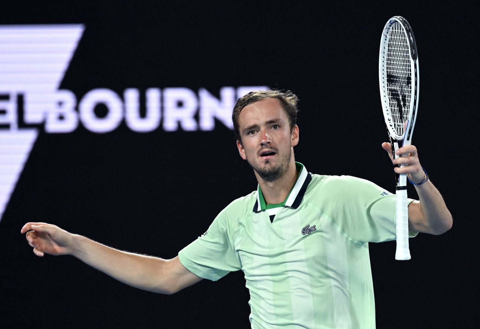 epa09710270 Daniil Medvedev of Russia reacts during his men's quarter final match against Felix Auger-Aliassime of Canada at the Australian Open Grand Slam tennis tournament at Melbourne Park in Melbourne, Australia, 26 January 2022.  EPA/DAVE HUNT AUSTRALIA AND NEW ZEALAND OUT