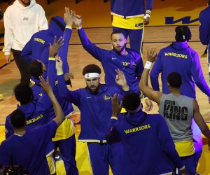 epa09713595 Golden State Warriors guard Klay Thompson (Bottom-C) and Golden State Warriors guard Stephen Curry (Top-C) high five teammates during introductions before their NBA game between the Minnesota Timberwolves and the Golden state Warriors at Chase Center in San Francisco, California, USA, 27 January 2022.  EPA/JOHN G. MABANGLO  SHUTTERSTOCK OUT