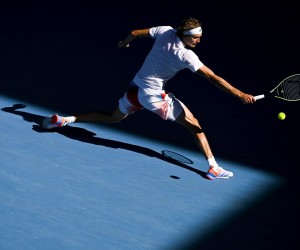 epa09703495 Alexander Zverev of Germany returns to Denis Shapovalov of Canada in their fourth round match during the Australian Open Grand Slam tennis tournament in Melbourne, Australia, 23 January 2022.  EPA/DEAN LEWINS  AUSTRALIA AND NEW ZEALAND OUT