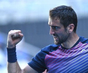 epa09705804 Marin Cilic of Croatia reacts during his fourth round singles match against Felix Auger-Aliassime of Canada at the Australian Open Grand Slam tennis tournament at Melbourne Park, in Melbourne, Australia, 24 January 2022.  EPA/JAMES ROSS  AUSTRALIA AND NEW ZEALAND OUT