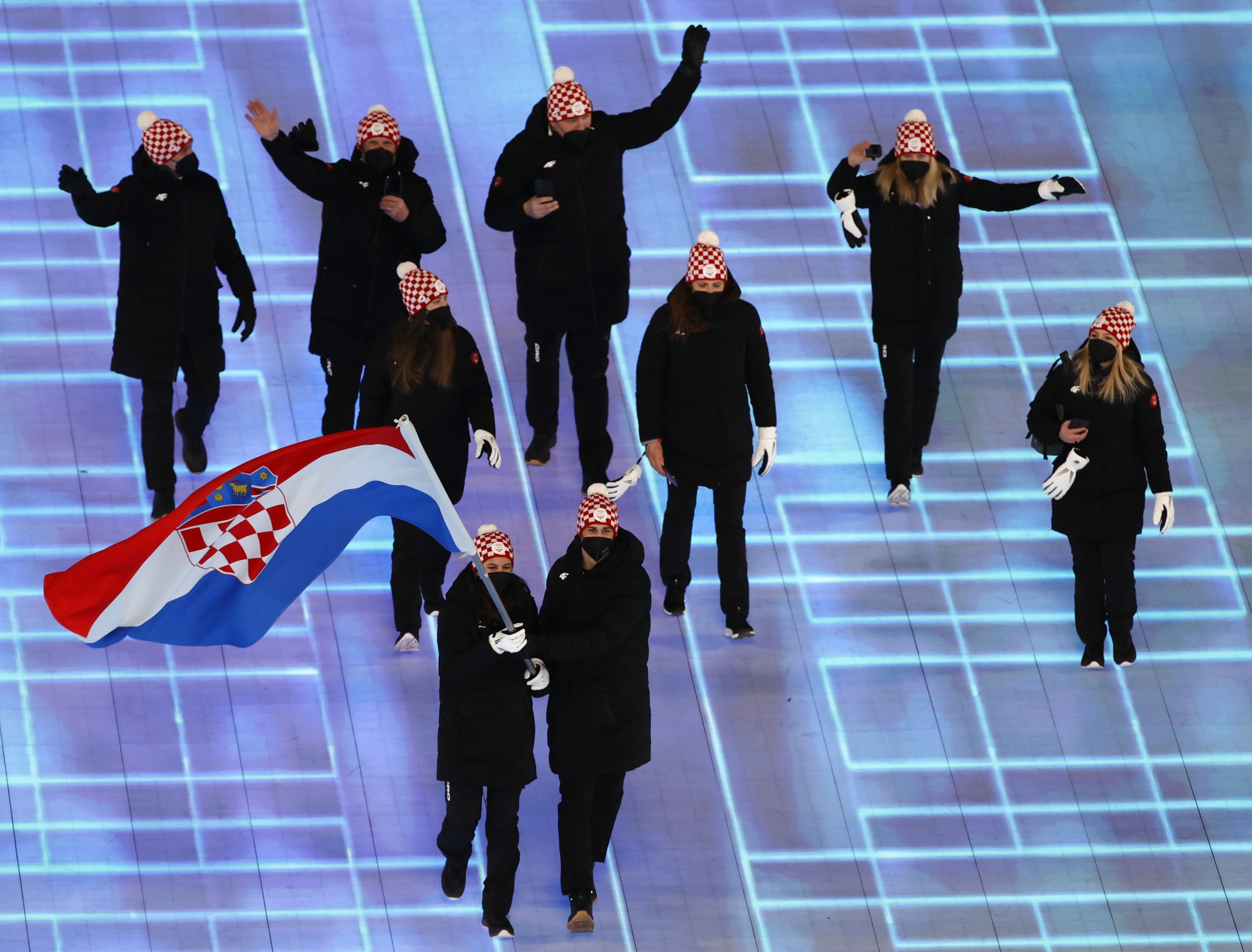 epa09727560 Athletes of Croatia arrive for the Opening Ceremony of the Beijing 2022 Olympic Games at the National Stadium, also known as Bird's Nest, in Beijing China, 04 February 2022.  EPA/ROMAN PILIPEY