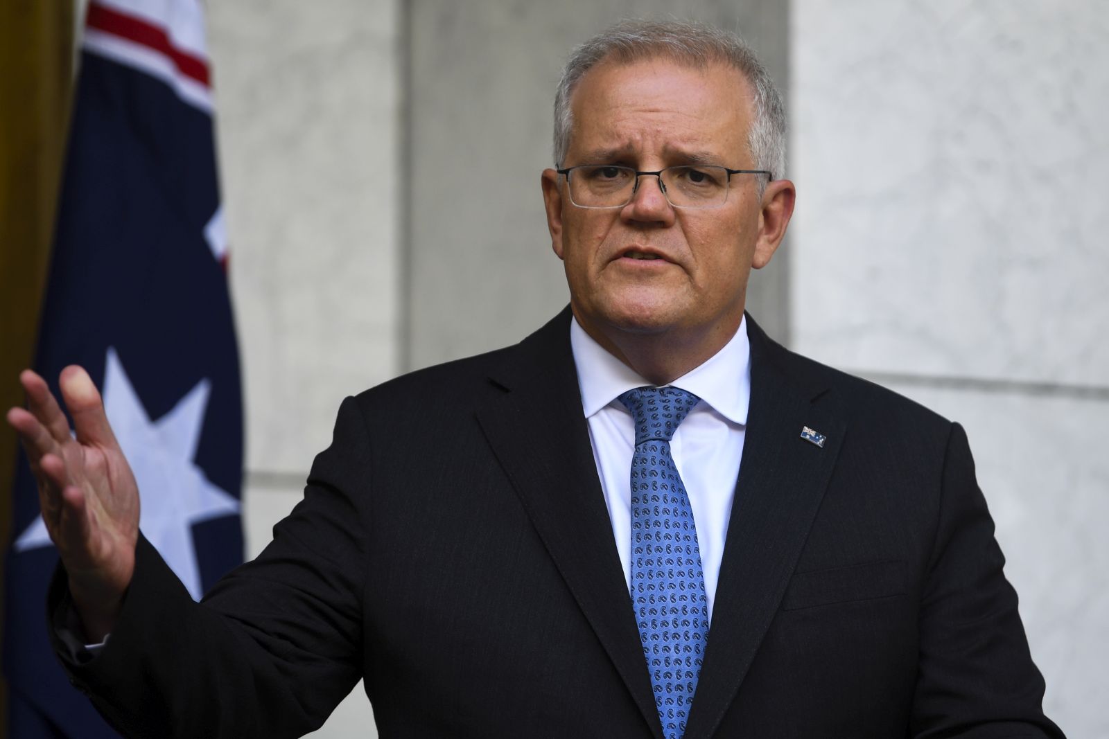 epa09734212 Australian Prime Minister Scott Morrison speaks to the media during a press conference in Canberra, Australia, 07 February 2022.  EPA/LUKAS COCH AUSTRALIA AND NEW ZEALAND OUT