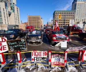 epa09736432 A view of downtown Ottawa and the Canadian parlement hill surrounded by truckers, after the mayor of Ottawa has declared a state of emergency in the Canadian capital after a 10-day-long protest by truck drivers over Covid-19 restrictions that has gridlocked its city center, in Ottawa, Canada, 07 February 2022. Truckers protested against the mandate by the Canadian government that truckers be vaccinated to return to Canada, and was joined by other opponents of the Canadian Prime Minister. Policemen from Ottawa city, Ontario, and the Federal Royal Canadian Mounted Police (RCMP) are deployed.  EPA/ANDRE PICHETTE
