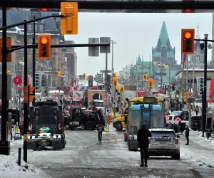 epa09739416 A view of parked trucks as truckers continue to protest the vaccine mandates in in downtown Ottawa, Ontario, Canada, 08 February 2022. Since 29 January 2022, truckers are protesting against the mandate by the Canadian government that truckers be vaccinated against COVID-19 to return to Canada, and was joined by other opponents of the Canadian Prime Minister. A  state of emergency was declared in the city of Ottawa on 06 Febraury 2022 and policemen from Ottawa city, Ontario, and the Federal Royal Canadian Mounted Police (RCMP) are deployed.  EPA/Kadri Mohamed