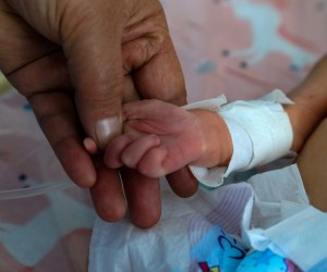 epa09742895 An Afghan nurse attends to newborn babies at Malalai National And Specialized Hospital catering to maternity needs of Afghan women, in Kabul, Afghanistan, 08 February 2022 (issued 10 February 2022). The Taliban government has appointed doctor Malalai Faizi as the director of a maternity hospital in Kabul in the first ever appointment of a woman as the head of a public institution under the Islamist administration. The appointment is an unprecedented moment in the Taliban's policies towards women since the Islamists seized power on Aug.15, as women had been excluded from public offices so far, apart from facing curbs on their freedom of movement and accessing high-school education as well as other jobs. The Unicef has warned that one million children in Afghanistan may die of acute malnutrition if urgent action wasn't taken. According to UN estimates, more than half of the population will be facing famine this winter, and 97 percent of the population could fall below the poverty line this year.  EPA/STRINGER