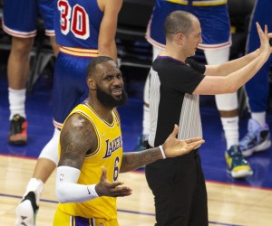 epa09751487 Los Angeles Lakers forward LeBron James (L) reacts to being called for a loose ball foul during the second half of their NBA game at Chase Center in San Francisco, California, USA, 12 February 2022.  EPA/D. ROSS CAMERON  SHUTTERSTOCK OUT