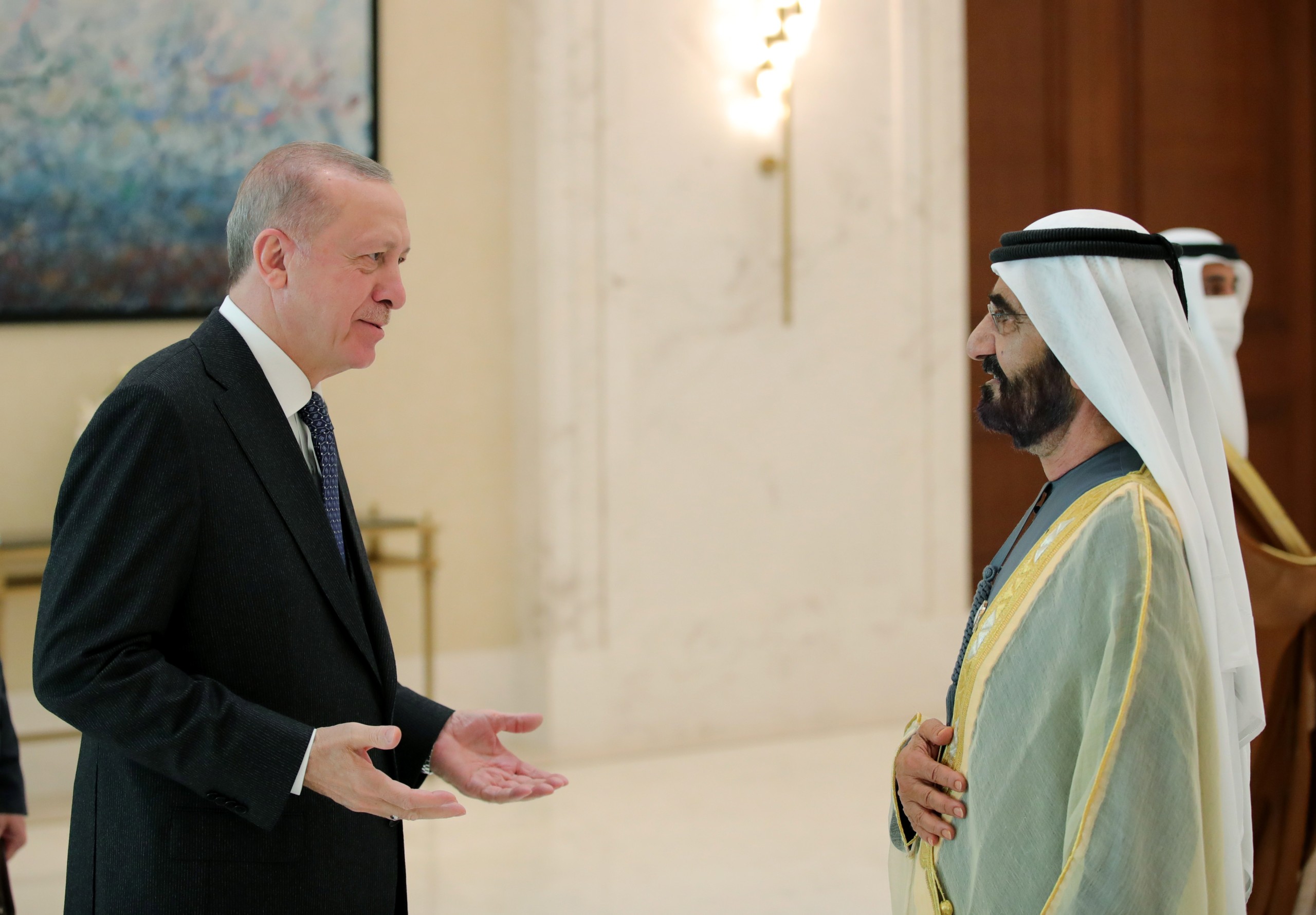 epa09758503 A handout photo made available by the Turkish President Press Office shows Ruler of Dubai and UAE Prime Minister Mohammed bin Rashid Al Maktoum (R) and Turkish President Recep Tayyip Erdogan (L) during their meeting in Dubai, United Arab Emirates, 15 February 2022. Turkish President Erdogan is in the UAE  for a two-days official visit, during which he will also attend the Dubai Expo.  EPA/TURKISH PRESIDENT PRESS OFFICE HANDOUT  HANDOUT EDITORIAL USE ONLY/NO SALES
