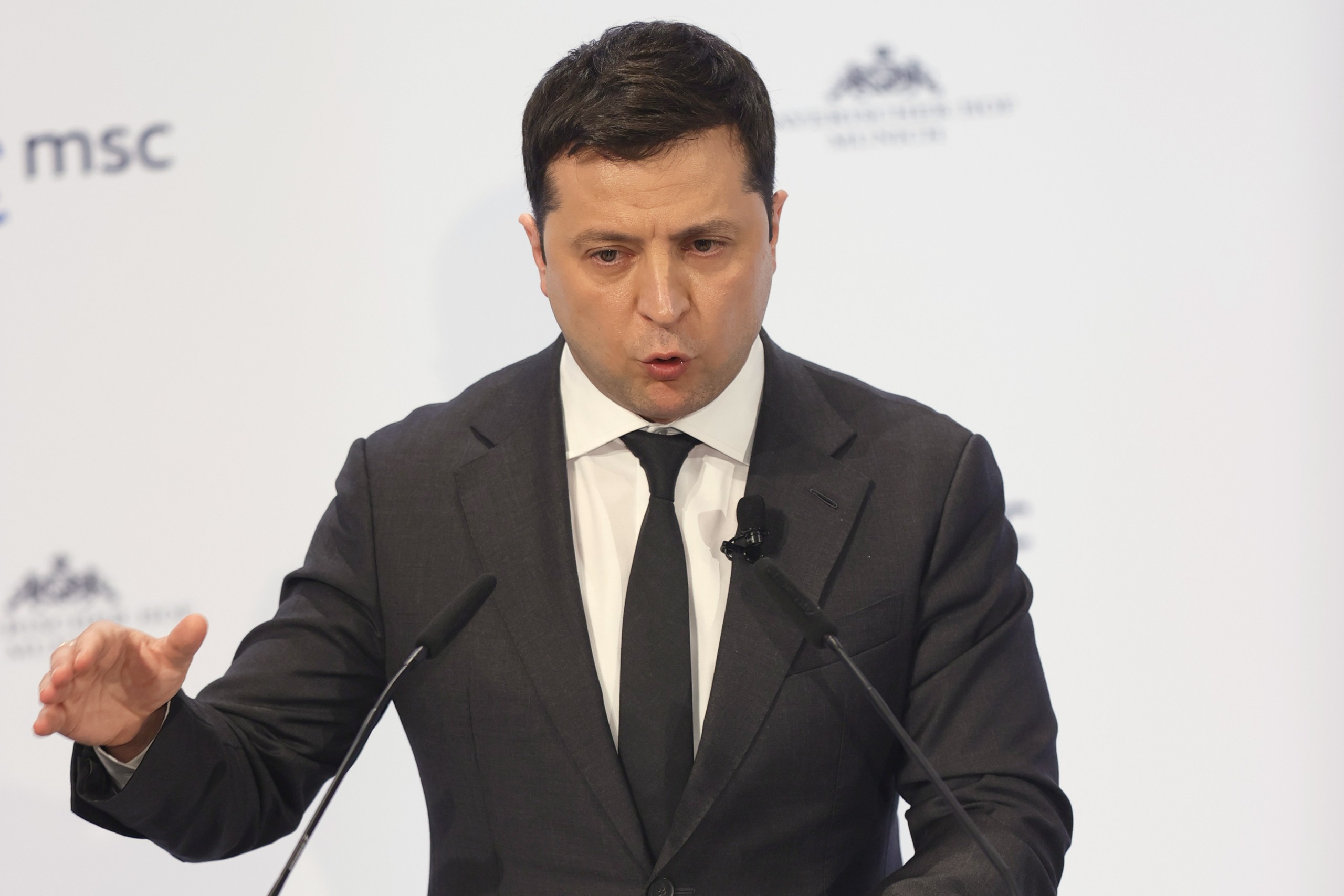 epa09772090 Ukrainian President Volodymyr Zelensky delivers a statement during the 58th Munich Security Conference (MSC)  in Munich, Germany, 19 February 2022. More than 500 high-level international decision-makers meet at the 58th Munich Security Conference in Munich during their annual meeting from 18 to 20 February 2022 to discuss global security issues.  EPA/RONALD WITTEK / POOL