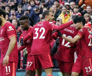 epa09772603 Liverpool's Luis Diaz (R) celebrates with teammates after scoring the 3-1 lead during the English Premier League soccer match between Liverpool FC and Norwich City in Liverpool, Britain, 19 February 2022.  EPA/TIM KEETON EDITORIAL USE ONLY. No use with unauthorized audio, video, data, fixture lists, club/league logos or 'live' services. Online in-match use limited to 120 images, no video emulation. No use in betting, games or single club/league/player publications.