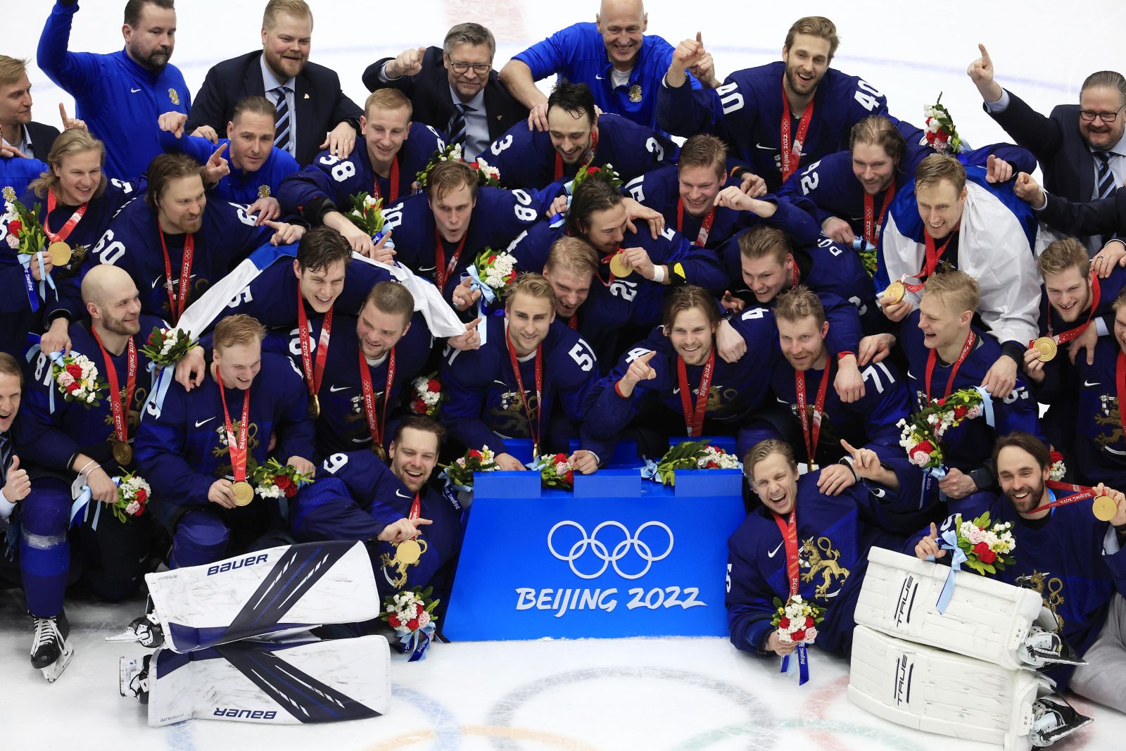 epa09773730 Gold medalists Team Finland pose with their medals after the Men's Ice Hockey gold medal match between Finland and the Russian Olympic Committee at the Beijing 2022 Olympic Games, Beijing, China, 20 February 2022. Finland won 2-1.  EPA/ALEX PLAVEVSKI