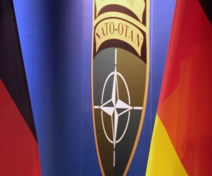 epa09777034 A view of Germany national flags and the logo of the NATO enhanced Forward Presence (EFP) Battalion Battle Group are pictured during a joint press conference of the German and Lithuanian defense ministers at Rukla Military Base, Lithuania, 22 February 2022. German Defence Minister Lambrecht visited Rukla due to regional tensions concerning a probable Russian invasion into Ukraine, bilateral cooperation on defense, and other pressing issues. Germany is leading a NATO-led battlegroup in Lithuania with more than 1,000 troops, one of four missions NATO sent to the Baltic states and Poland in 2017 in response to Russia's annexation of Ukraine's Crimean peninsula in 2014. Germany, one of Lithuania's key allies in security and defense, has recently sent additional 350 troops to Lithuania in response to the increasing tensions over Russian military activity near the Ukrainian borders and over concerns for the security environment in the Baltics.  EPA/VALDA KALNINA