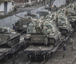epa09778300 Russian armored vehicles at the railway station in Rostov region, Russia, 23 February 2022. The Russian president on 21 February convened an extraordinary meeting of the Russian Security Council, to discuss the recognition of the self-proclaimed Donetsk People's Republic (DNR) and Luhansk People's Republic (LNR). On the same day he signed a decree recognizing the two republics of Donbass as independent states, as well as an agreement on friendship, cooperation and mutual assistance. The Russian Defense Ministry was instructed to ensure the maintenance of peace by the Russian armed forces.  EPA/STRINGER