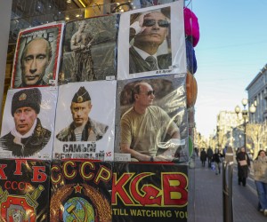 epa09784443 Photos of Russian President Vladimir Putin are displayed at a souvenir shop in downtown Moscow, Russia, 25 February 2022.  EPA/MAXIM SHIPENKOV