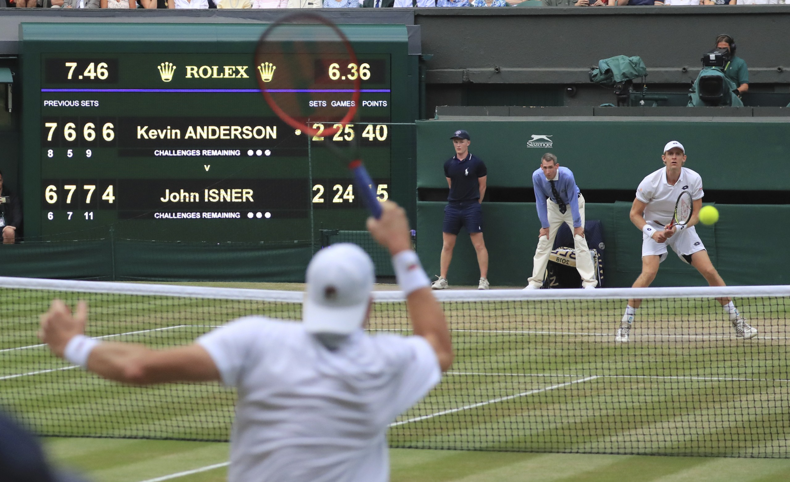 A scoreboard shows the time of the Gentlemen's Singles Semi-finals of the Wimbledon Championships between Kevin Anderson (R) of South Africa and John Isner of United States of America, 6hours and 36 minutes in London on July 13, 2018. Anderson won the event which was 6hours 36 minutes match that is the second longest in the Wimbledon Championships singles( The Yomiuri Shimbun via AP Images )