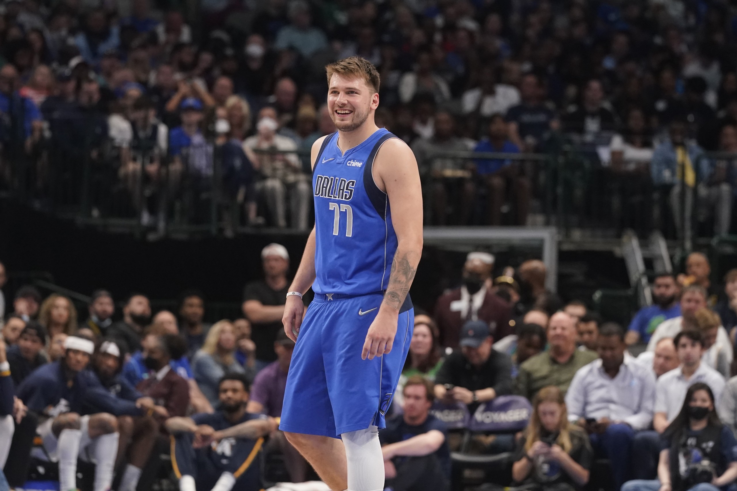 Dallas Mavericks guard Luka Doncic (77) smiles during the second half of an NBA basketball game against the Utah Jazz in Dallas, Sunday, March 27, 2022. (AP Photo/LM Otero)