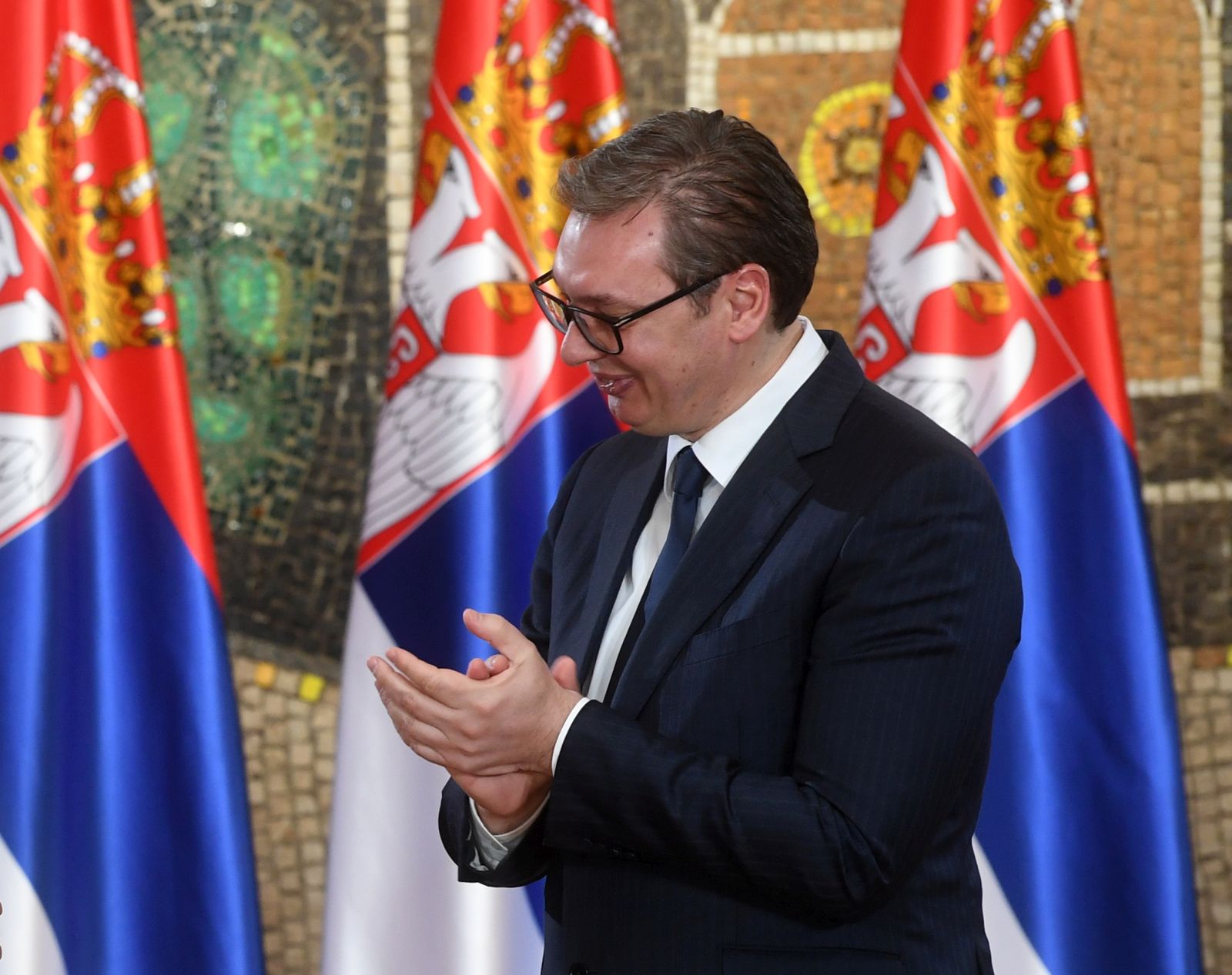 epa09759585 A handout photo made available by Serbian Presidency shows US actor Johnny Depp (L) receives a decoration from Serbian President Aleksandar Vucic (R) in Belgrade, Serbia, 15 February 2022. Johnny Depp was awarded the Gold Medal of Merit of the Republic of Serbia for his contributions to the country's continued efforts to enhance and expand its local community of artists.  EPA/DIMITRIJE GOLL / SERBIAN PRESIDENCY / HANDOUT  HANDOUT EDITORIAL USE ONLY/NO SALES