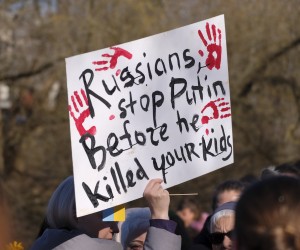 epa09789013 People hold posters as they gather during a protest in support of Ukraine in Vilnius, Lithuania, 27 February 2022. Several thousand people protested in front of the Russian embassy against the war in Ukraine. Since 24 February 2022, the territory of Ukraine is under attack by Russia.  EPA/VALDA KALNINA