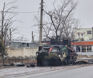 epa09796661 A view of a damaged armored vehicle after shelling in the city of Kharkiv, Ukraine, 02 March 2022. Russian troops entered Ukraine on 24 February prompting the country's president to declare martial law and triggering a series of severe economic sanctions imposed by Western countries on Russia.  EPA/SERGEY KOZLOV