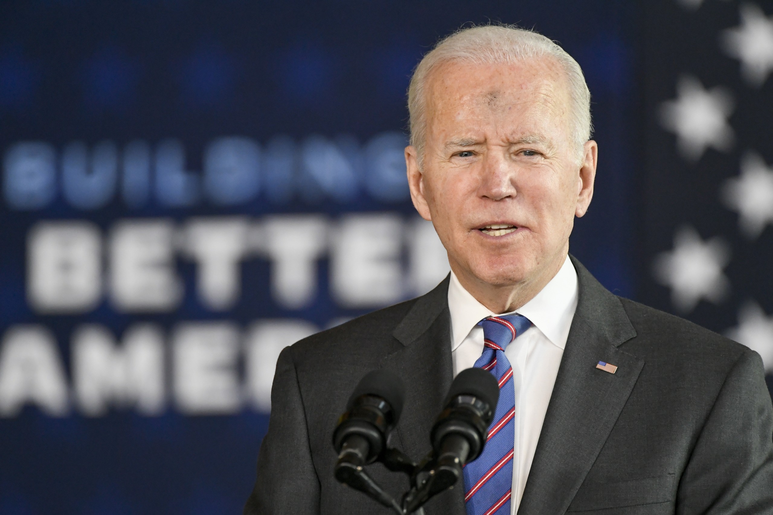 epa09797678 US President President Joe Biden, with his forehead smudged with ash on Ash Wednesday, speaks about the one trillion US dollars infrastructure bill at the University of Wisconsin-Superior, in Superior, Wisconsin, USA, 02 March 2022.  EPA/CRAIG LASSIG